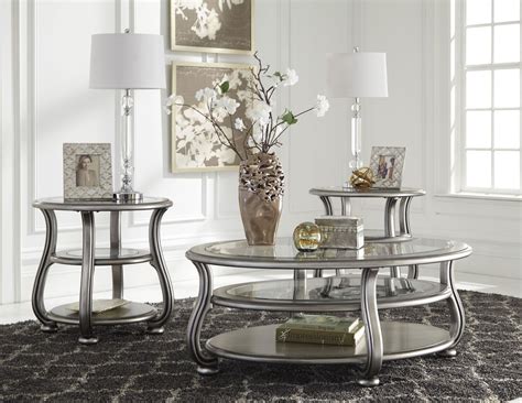 Coralayne Silver Round End Table from Ashley (T820-6) | Coleman Furniture