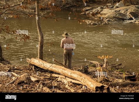 Old Man And The River Stock Photo - Alamy