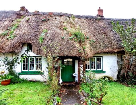 Ireland, Co. Limerick – Adare, Cottage with tumbledown thatched roof ...