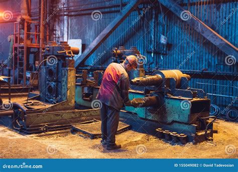 Heavy Industry Worker Working Machine. Rough Industrial Environment Stock Photo - Image of ...