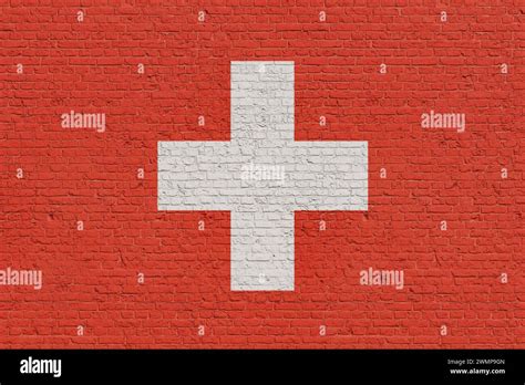 Switzerland flag colors painted on a brickwall. Switzerland flag colors ...