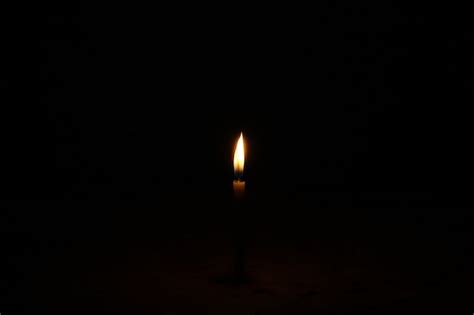 Free Photo | Burning candle on a dark background