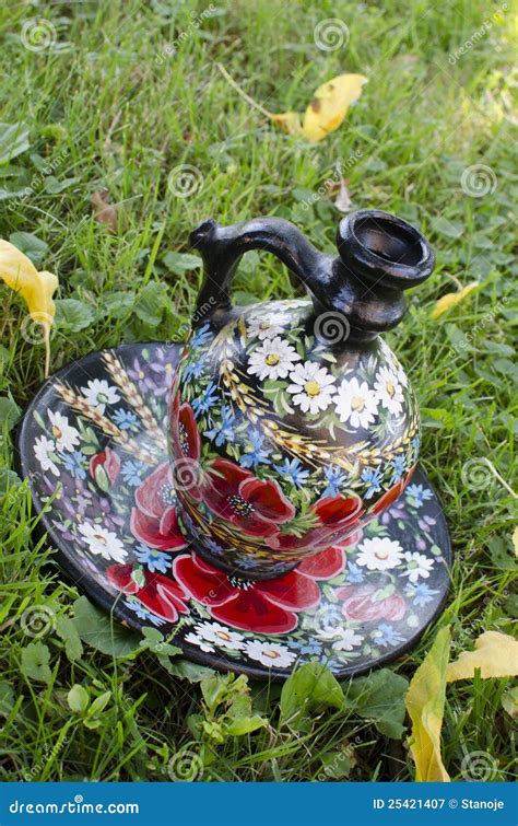 Antique jug with flowers stock image. Image of clay, flowers - 25421407