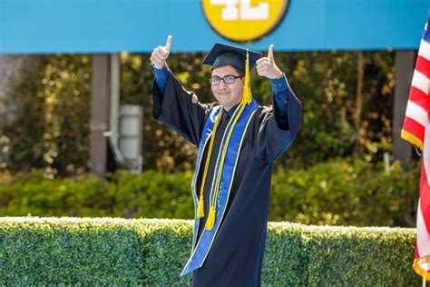 Photo | UCLA Commencement 2021 - student thumbs up | UCLA