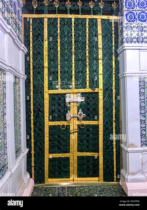 MEDINA, SAUDI ARABIA - JUNE 24, 2019: The tomb of the Islamic prophet Muhammad and tomb door on ...