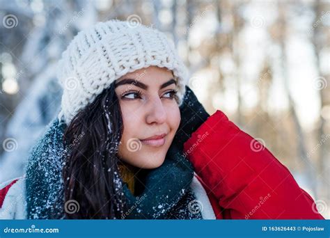 A Front View Portrait of Young Woman Standing Outdoors in Snowy Winter ...