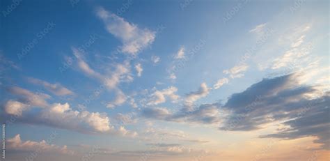 Blue sky clouds background. Beautiful landscape with clouds and orange sun on sky Stock Photo ...