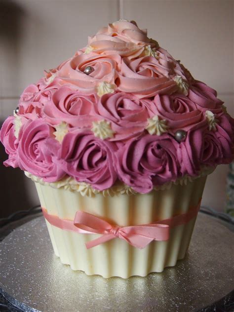 pink and cream confection | Large cupcake cakes, Big cupcake, Giant cupcake cakes