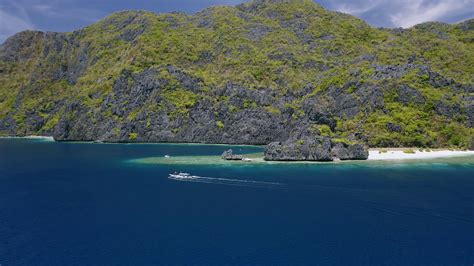 4K Aerial view of strait near Matinloc Island in El Nido, Palawan, Philippines. Toursit ...