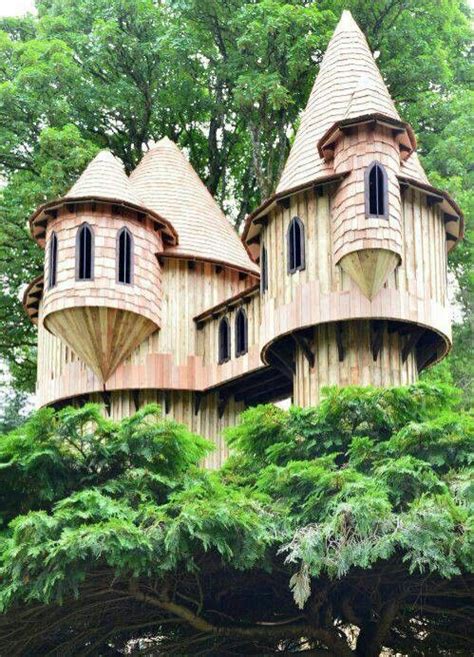 More like a tree castle | Tree house designs, Wooden tree house, Cool ...