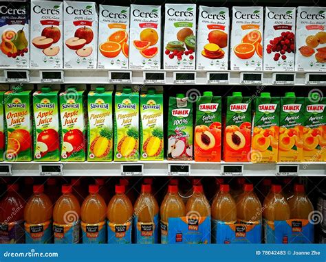 Variety Of Fruit Juice On The Shelves In A Supermarket. Editorial Image | CartoonDealer.com ...