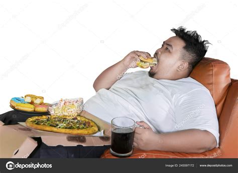 Unhealthy Lifestyle Concept Greedy Fat Man Eating Burger Junk Foods Stock Photo by ©realinemedia ...