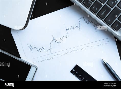 Stock chart and pan Stock Photo - Alamy