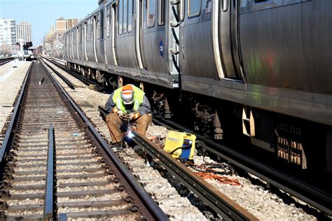 Third Rail Replacement | A welder secures jumper cables to t… | Flickr