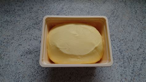 Freshly Opened Tub Of Butter : oddlysatisfying