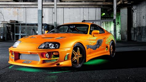 Toyota Supra with green neon lights - backiee