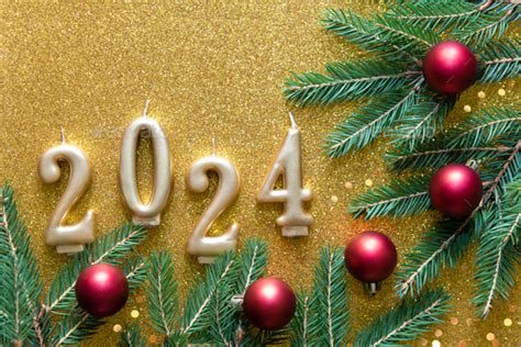 Happy new year 2024 gold background with gold number. Christmas card banner with round red balls ...