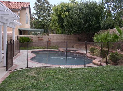 Mesh Pool Fence vs. Rod Iron Pool Fencing