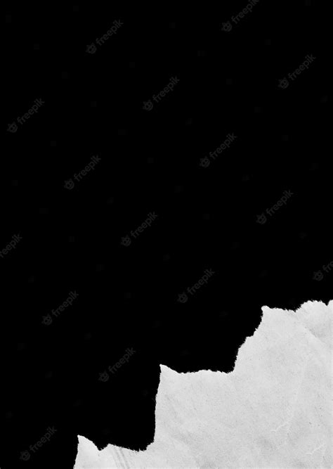 Premium Photo | Pieces of torn paper on black background with copy space for text