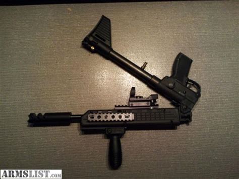 ARMSLIST - For Sale: Kel-Tec Sub 2000 9mm, Uses Standard Glock Magazines, Red Dot Sight