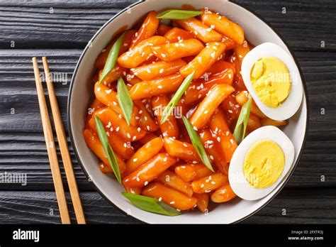 Tteokbokki also spelled ddukbokki, ddeokbokki, dukbokki or topokki is a beloved Korean rice cake ...