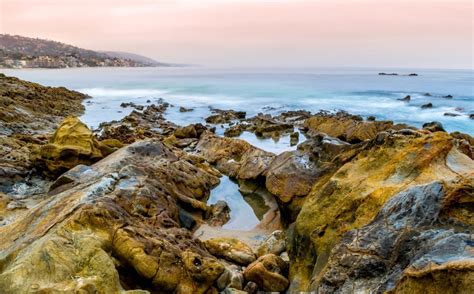 Sunrise over Laguna Beach, California. [OC] [2048x1273] : ImagesOfCalifornia