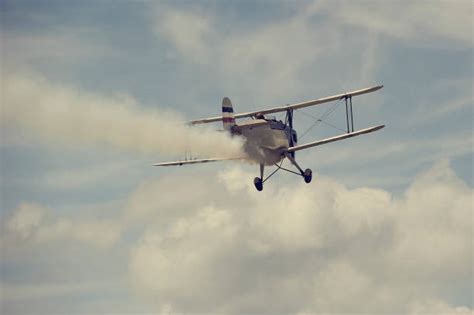 Airplane Stunt Old Fashioned Fighter Plane Stock Photos, Pictures & Royalty-Free Images - iStock