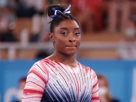 Simone Biles says she is 'still scared to do gymnastics' after getting the 'twisties' - a ...