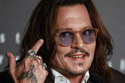 Johnny Depp May Be in the Caribbean, But He No Longer Has the Teeth of ...