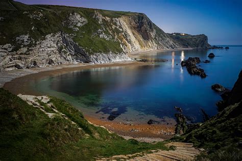 Man o war bay in England seen on a clear beautiful night. Photograph by ...