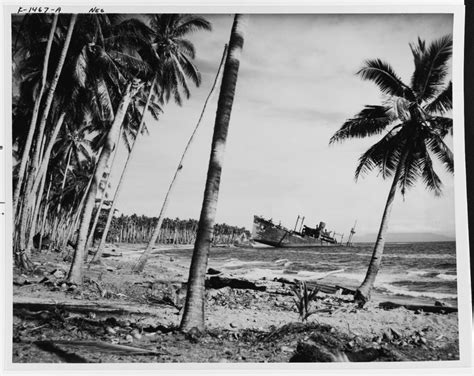 Japanese cargo vessel Kinugawa Maru beached & sunk on the Guadalcanal shore, Nov. 1943. She was ...