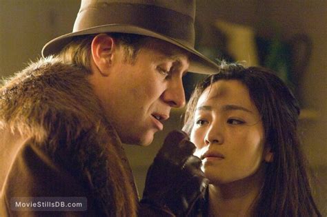 Hannibal Rising - Publicity still of Rhys Ifans & Gong Li