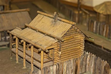 Premium Photo | Miniature toy house in the garden wooden houses in the village handmade housework