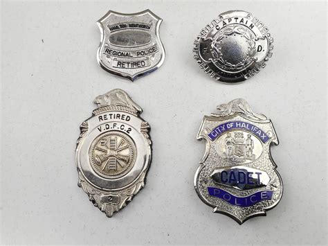 ASSORTED POLICE/FIRE DEPARTMENT BADGES