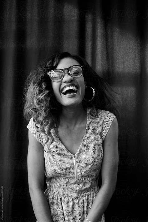 "Black And White Portrait Of A Young Woman Laughing" by Stocksy Contributor "Chelsea Victoria ...