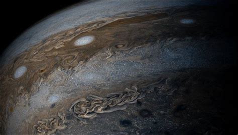 Jupiter gives a brilliant full view of its bands of clouds to Juno in enhanced colour! - See pic ...