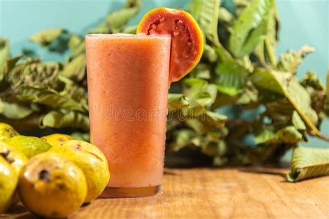 Glass of Guava Juice Psidium Guajava between Leaves and Fresh Fruits Stock Image - Image of ...