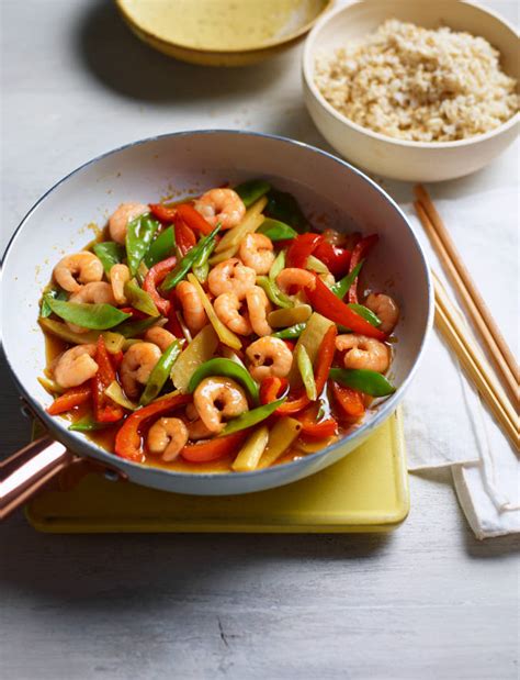 Sizzling garlic prawn stir-fry recipe | Sainsbury's Magazine