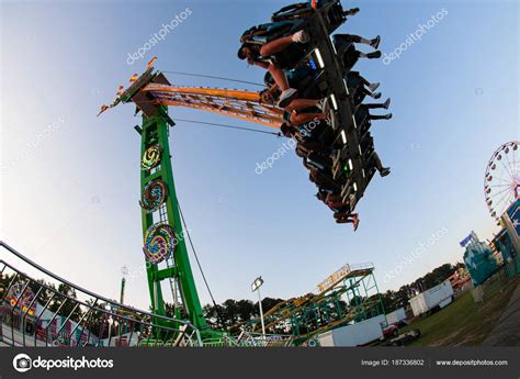 Teenagers Enjoy Speed And Height Of Ride At County Fair – Stock ...