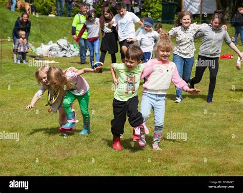 Three legged race at childrens sports at Rhu Gala, Argyll, Scotland ...