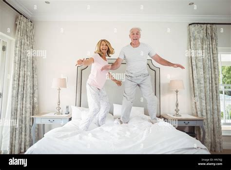 Couple dancing on bed hi-res stock photography and images - Alamy