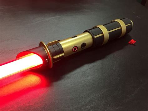 Darth Caedus Saber | Arm on Fire Custom Sabers | Darth caedus, Star wars light saber, Lightsaber ...