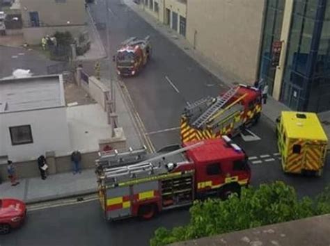 Three people attended by paramedics after small chemical spill at ...