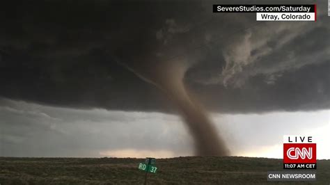 Smiling man captures video of rare twister - CNN Video