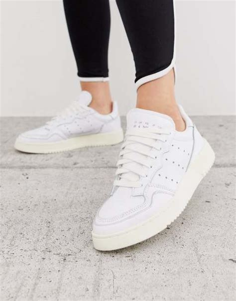 adidas Originals Home Of Classics Supercourt sneaker in white | ASOS