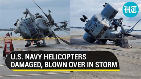 U.S Navy Seahawk & Sea Dragon helicopters blown over by wind, weeks after F/A-18 lost to rough ...