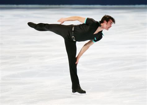 American figure skater Ryan Bradley performs a camel spin during the Men short skating event of ...