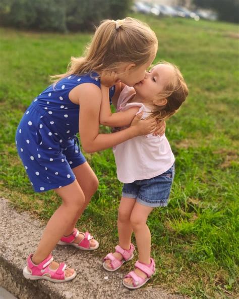 adorable sisters kissing each other in 2021 | Kids kiss, Pretty little girls, Beautiful children