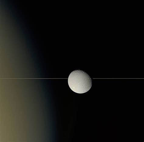 Saturn Moon Dione Toes the Line in Stunning NASA Photo | Space