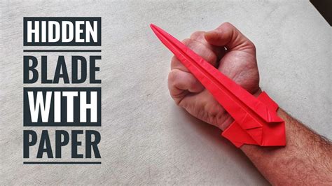 How to make hidden blade with paper. Easy origami assassin sword. Paper craft diy. - YouTube